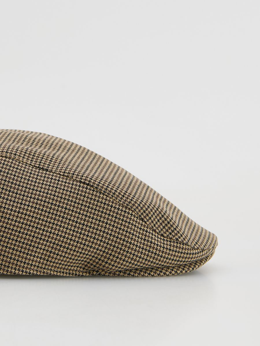 Berretto con visiera a quadri marrone