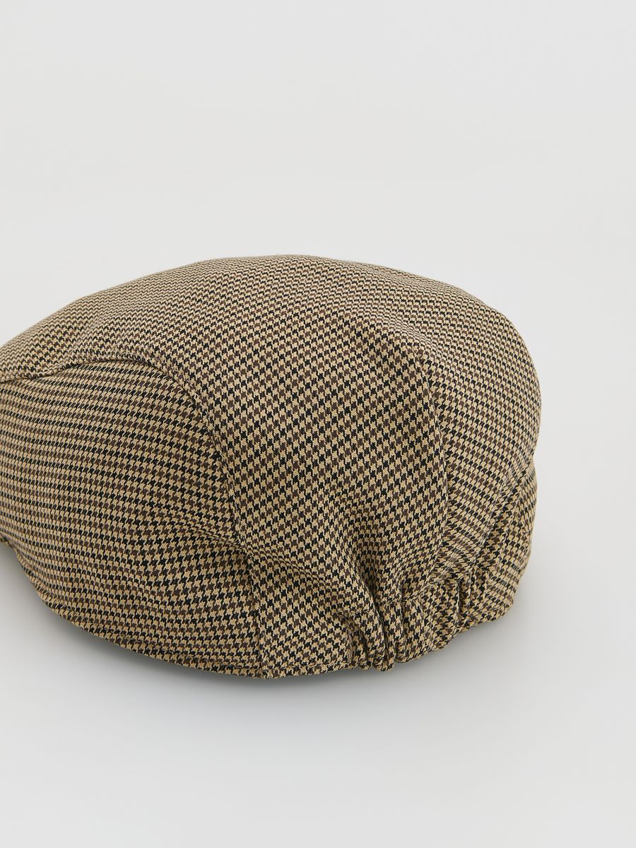Berretto con visiera a quadri marrone